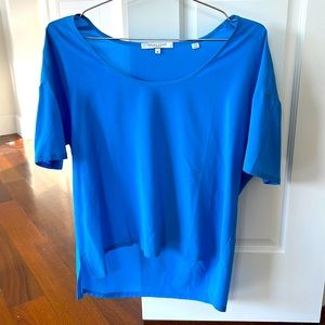Bella Luxx cobolt blue short sleeve silk blouse. Size Medium. Scoop neck design.